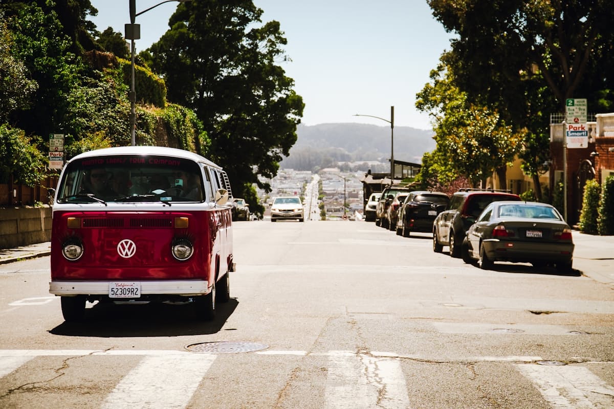 Vintage VW bus on a San Francisco street, a nod to Hippie Hill's 1960s roots
